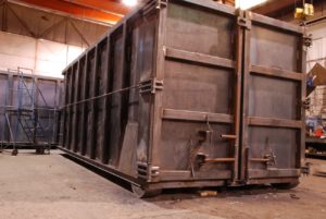 new JT Fabrication forty yard roll off container welded and ready for paint